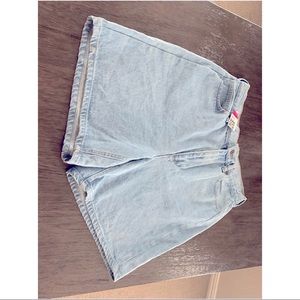 Light Colored high waisted Shorts.